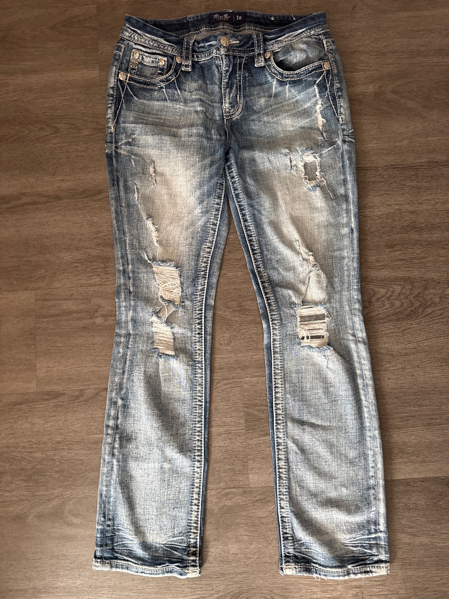 28 Miss Me Distressed Low Rise Straight Jeans