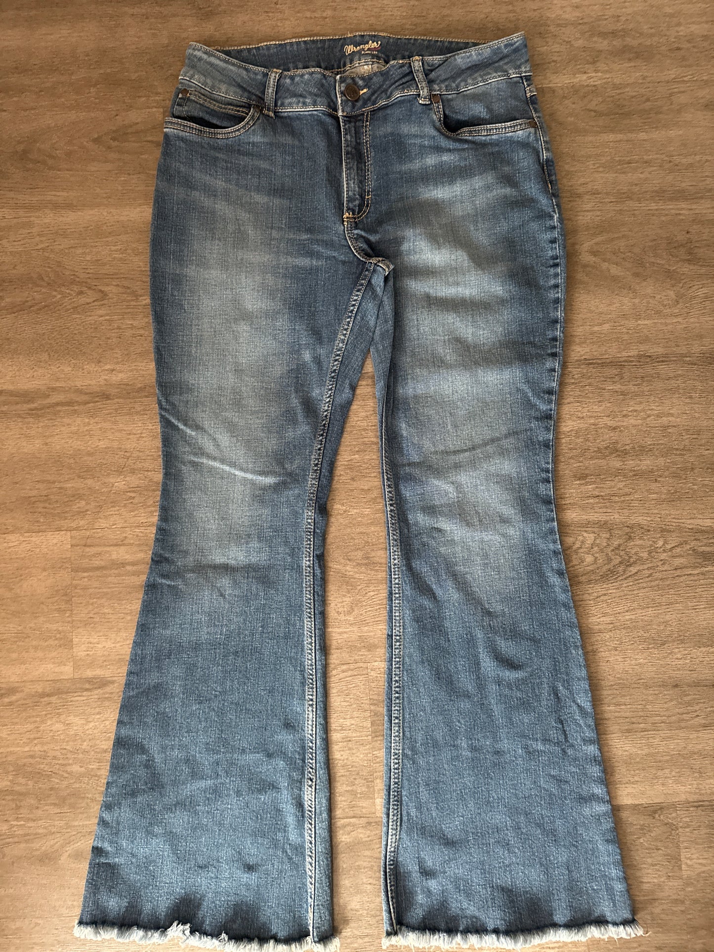 17 Wrangler Mid-Wash Flare Jeans