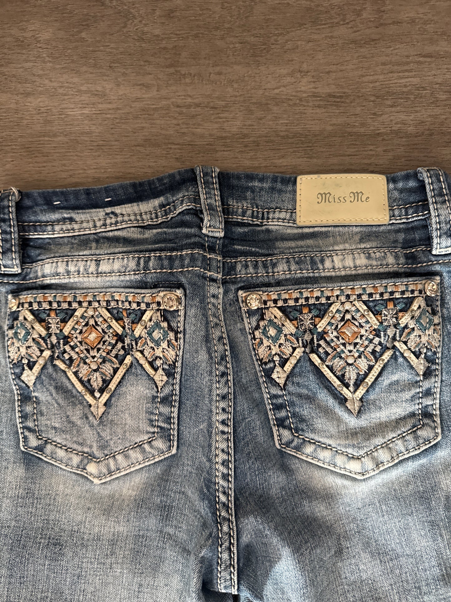 28 Miss Me Distressed Low Rise Straight Jeans